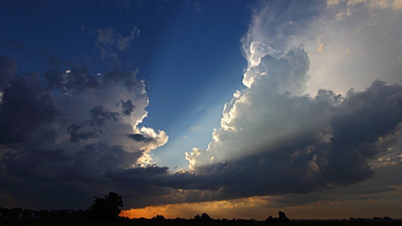 Cumulus Clouds at Sunset — Blue, Dramatic