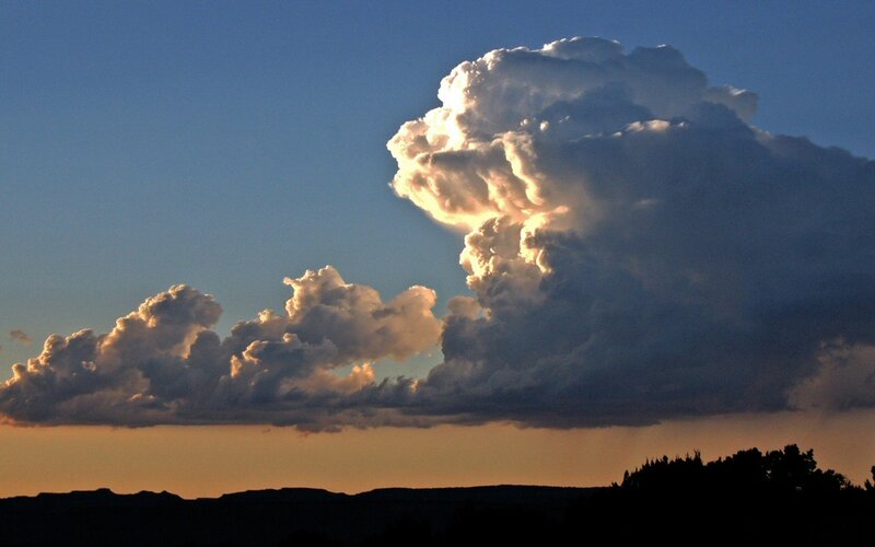 Cumulus Clouds at Sunset — Blue