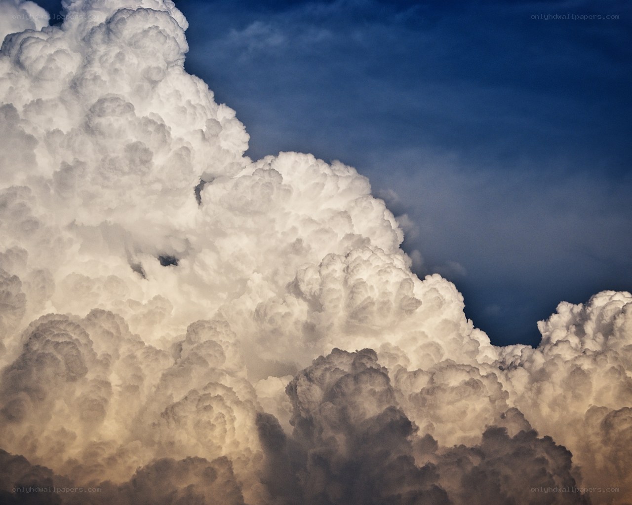 Cumulus clouds at sunset