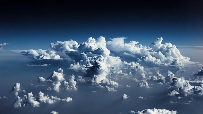 Cumulus Clouds from Above — Blue, Dramatic, Photograph