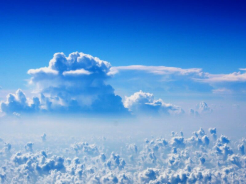 Cumulus Clouds from Above — Blue, Photograph