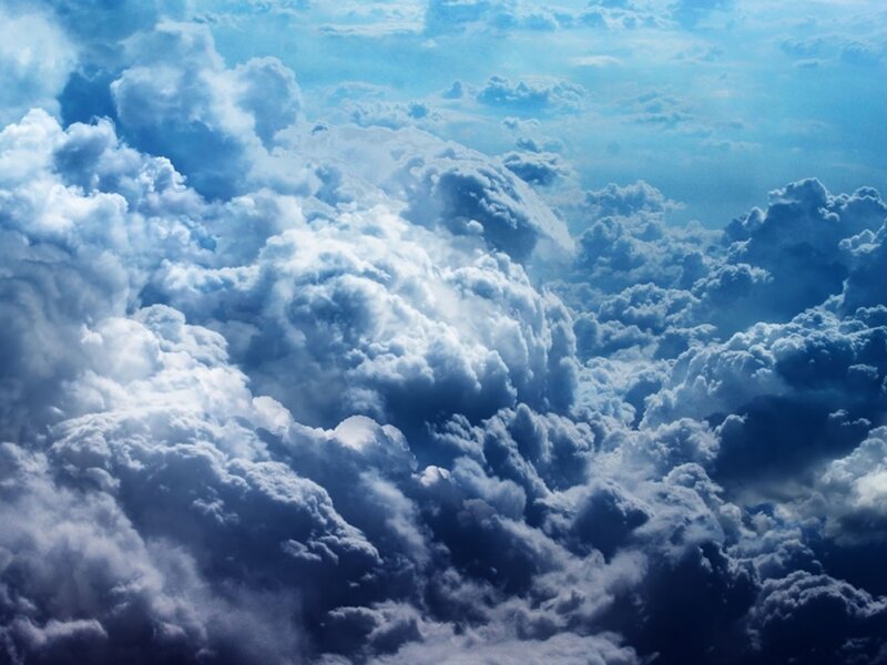 Cumulus Clouds from Above — Blue, Serene, Afternoon