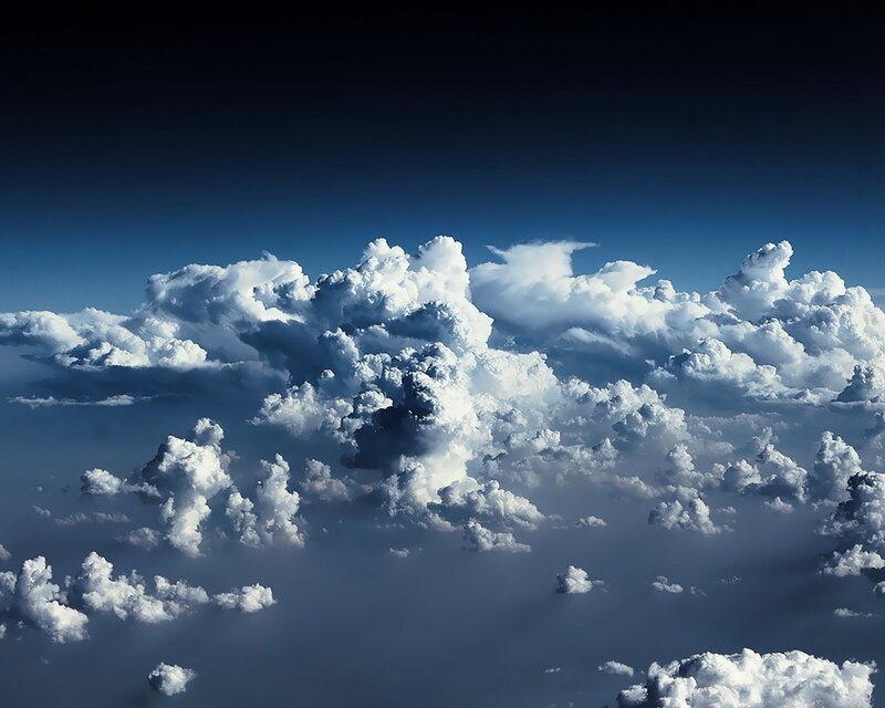 Cumulus Clouds from Above — Dramatic, Photograph