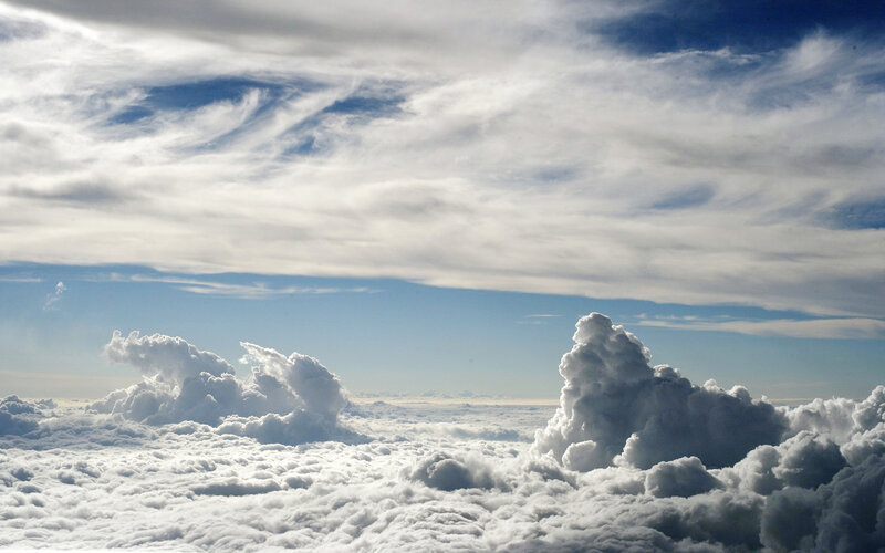 Cumulus Clouds from Above — Serene, Afternoon