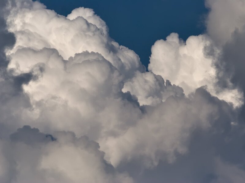 Cumulus clouds in blue sky