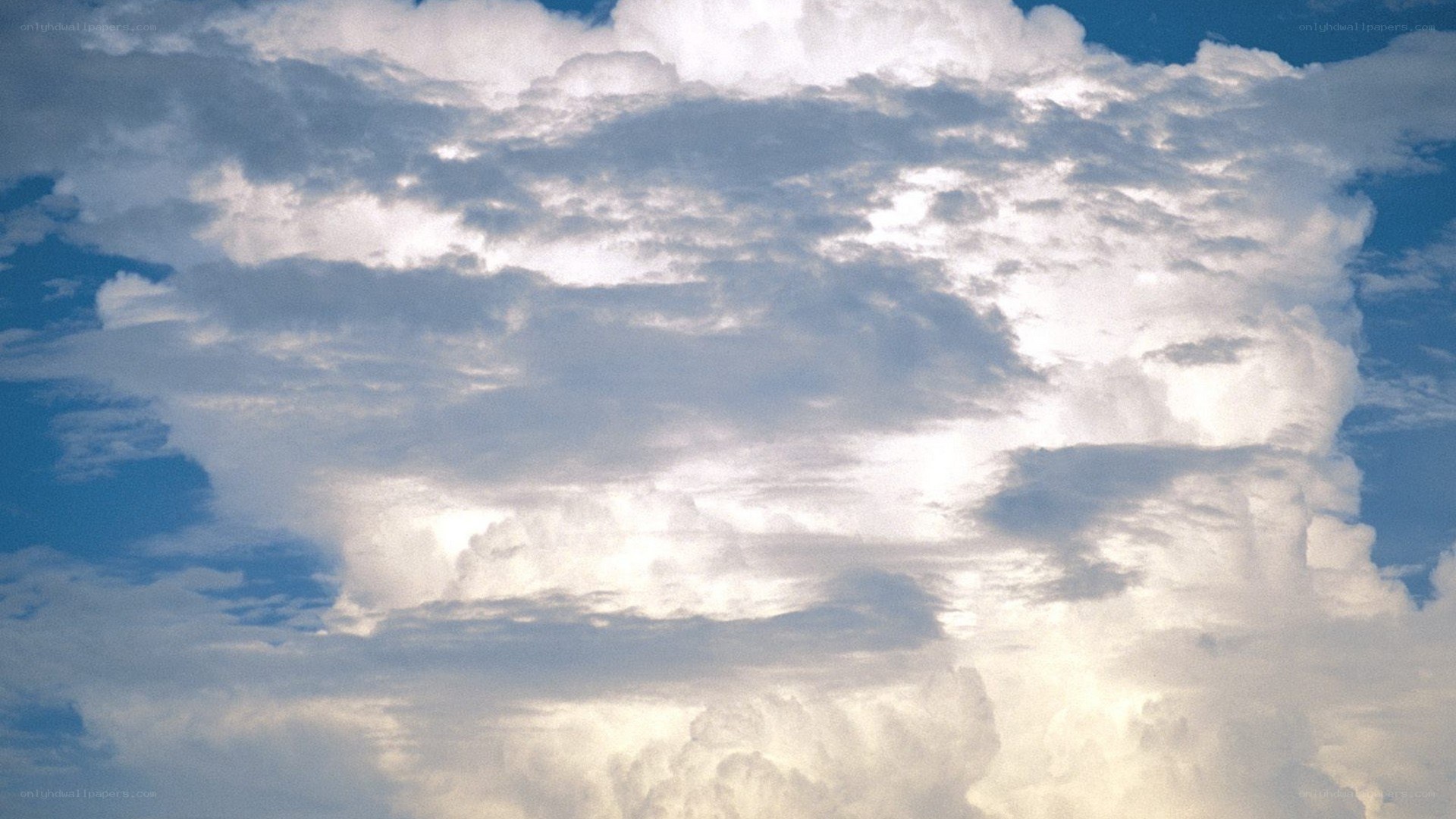 cumulus clouds in blue sky