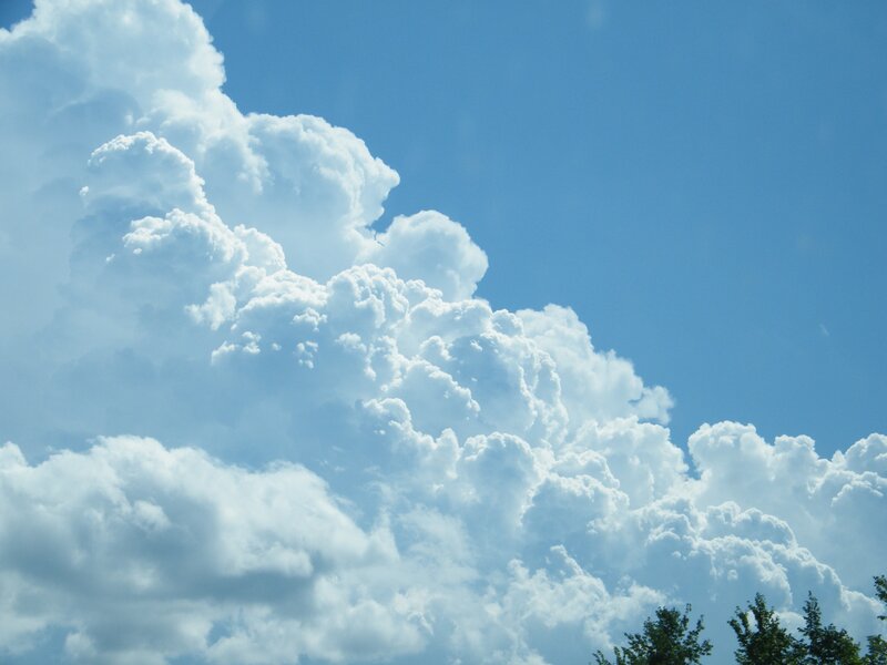 Cumulus clouds in blue sky