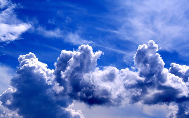 Cumulus Clouds in Blue Sky — Serene