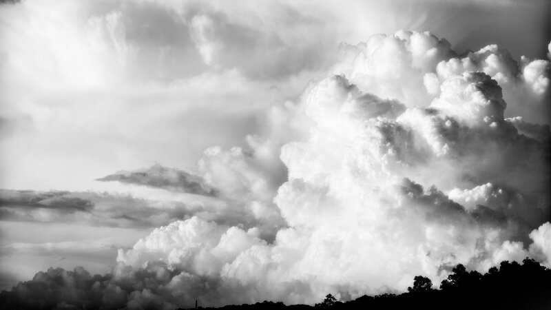 Cumulus Clouds in Sky — Black