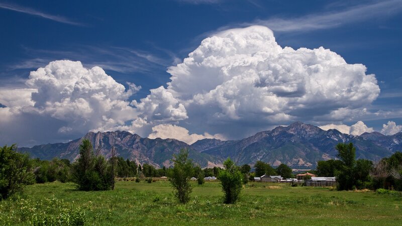 Cumulus Clouds over Mountains — Blue, Dramatic, Afternoon