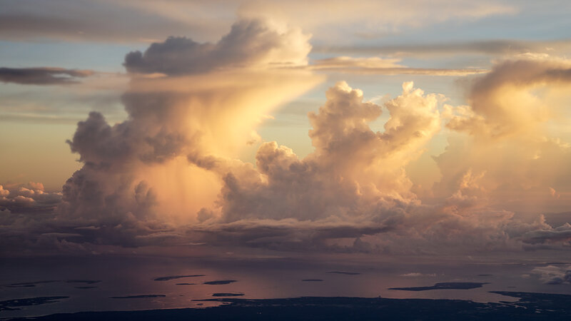 Cumulus Clouds over Water — Gold