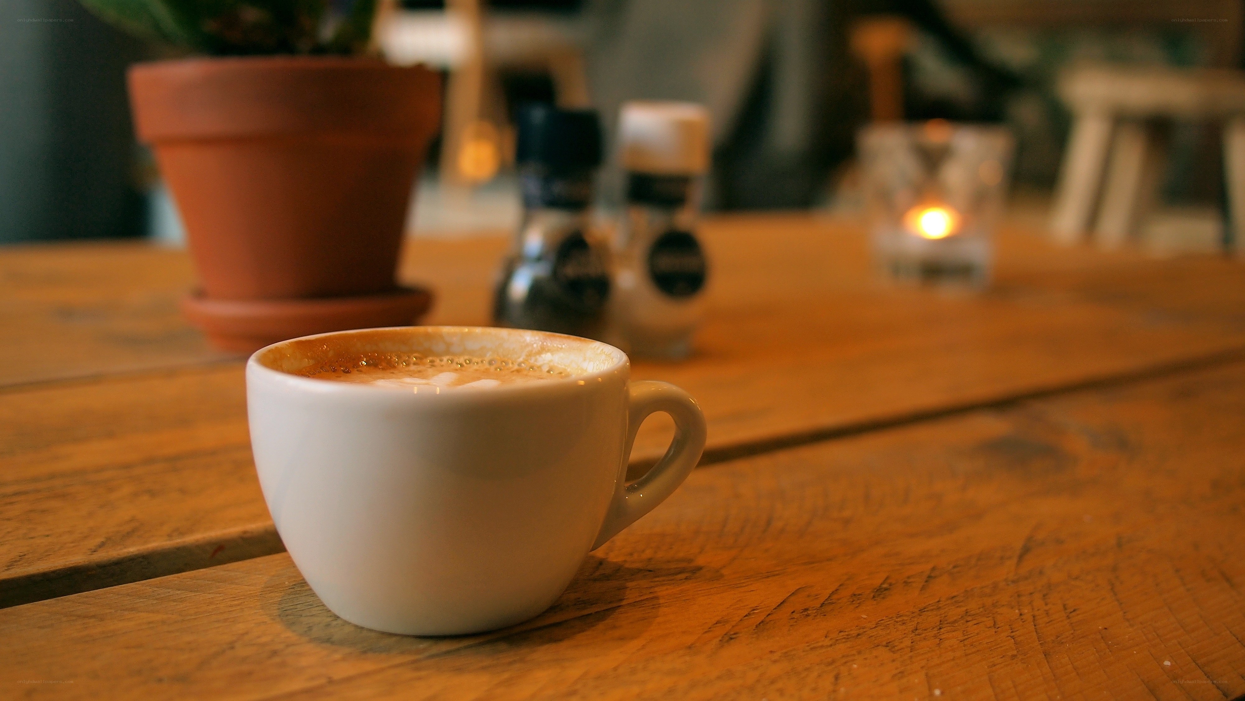 Cup of coffee on wooden table