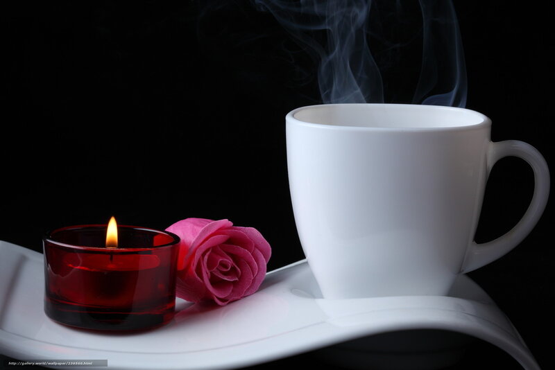Cup of coffee with candle