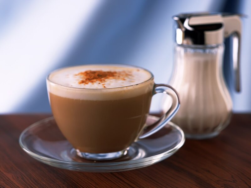 Cup of coffee with cinnamon