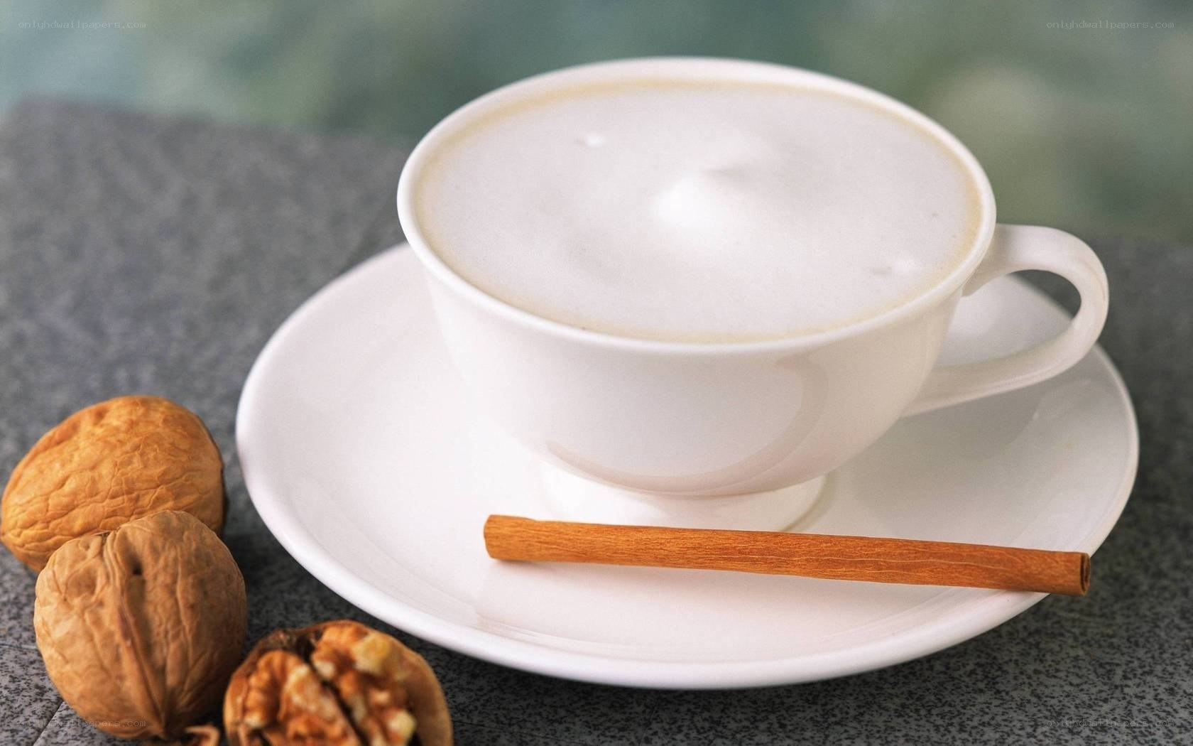 Cup of coffee with walnuts