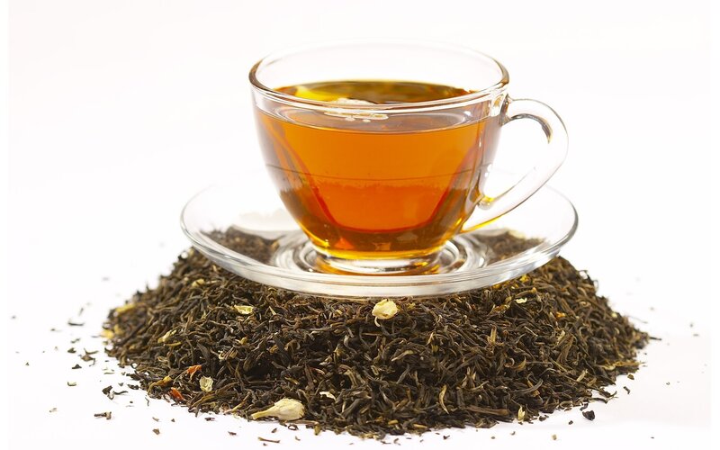 cup of tea with loose leaves