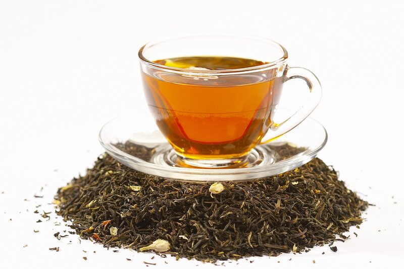 cup of tea with loose leaves