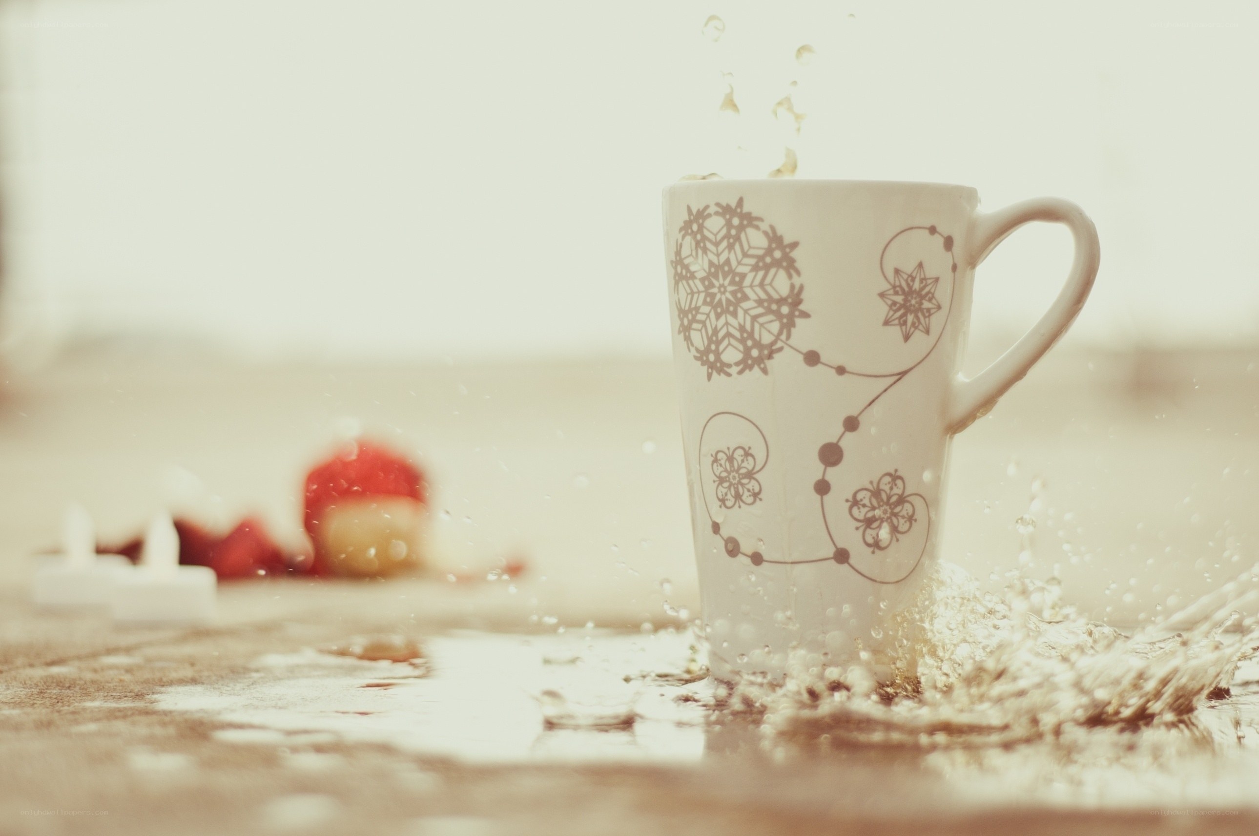 Cup splashing in water