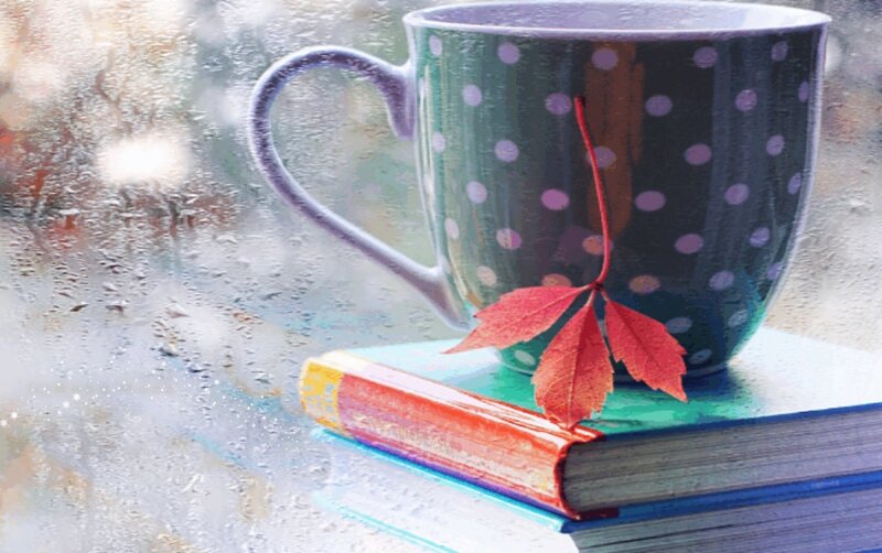 Cup with Leaf on Books