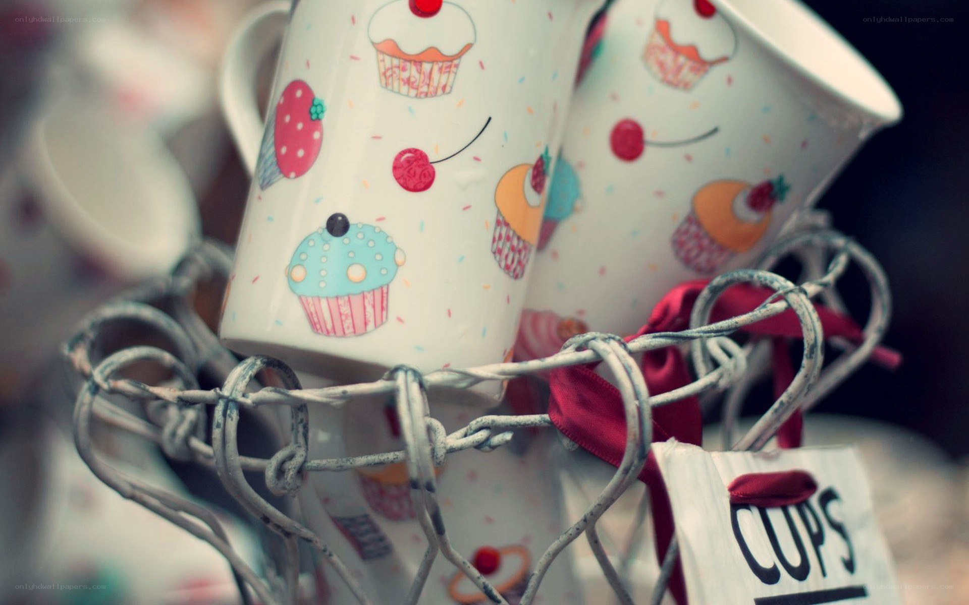 Cupcake mugs in wire basket