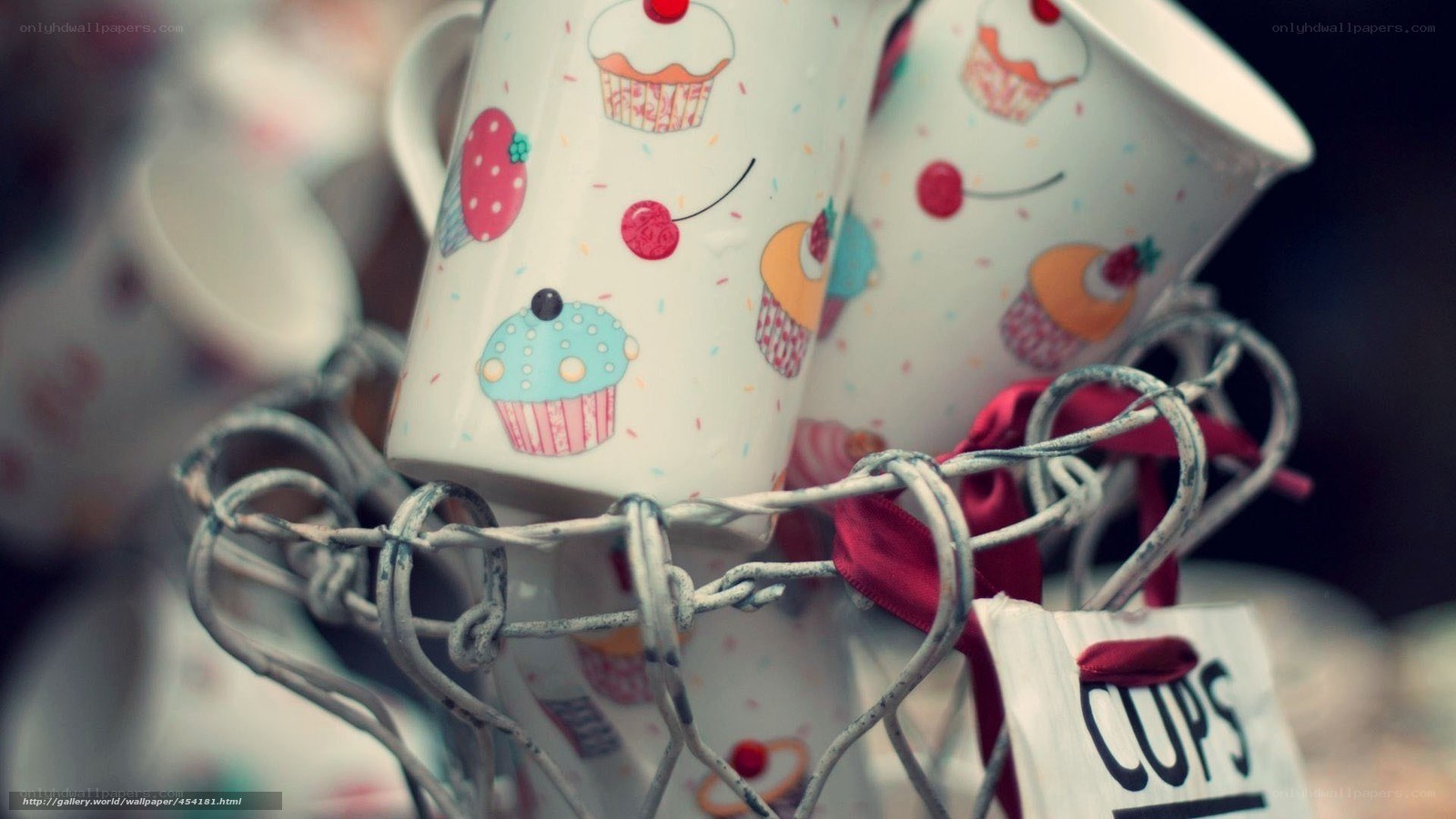 Cupcake mugs in wire basket