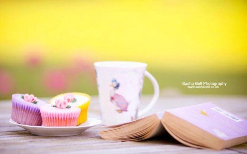 Cupcakes and Book on Table