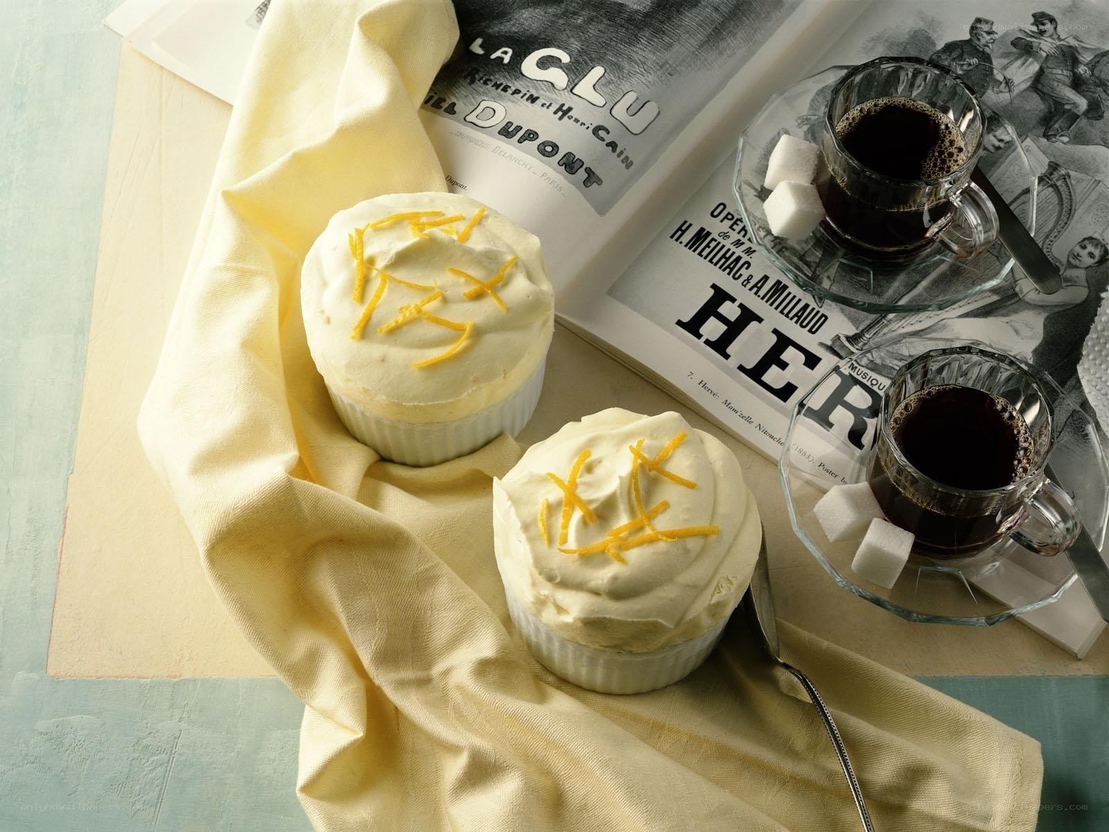 Cupcakes with coffee and book