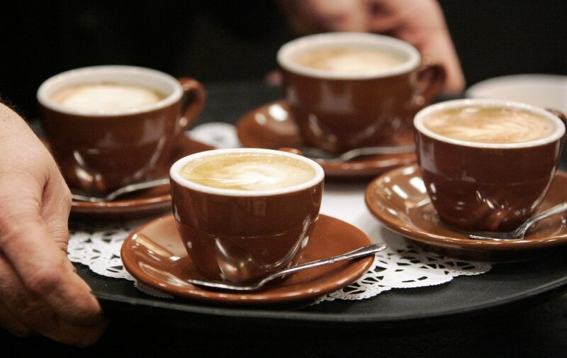 Cups of coffee on a tray