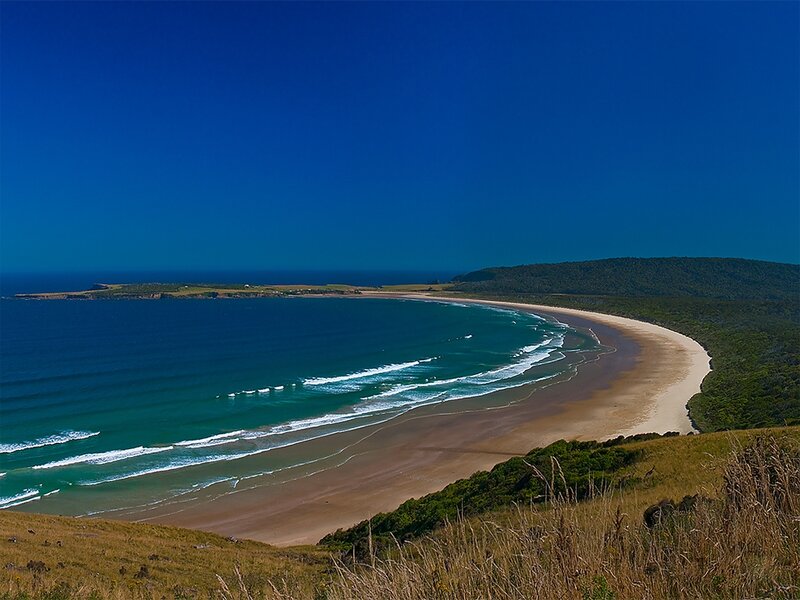 Curved Beach and Ocean — Blue