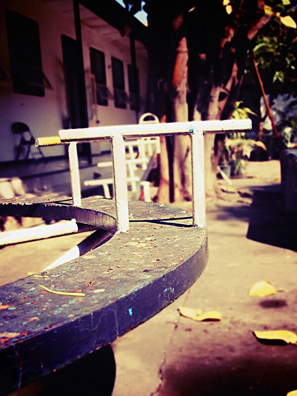 Curved Bench with Cigarette