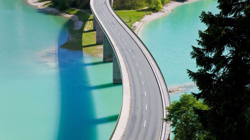 Curved Bridge over Lake — Blue, Serene