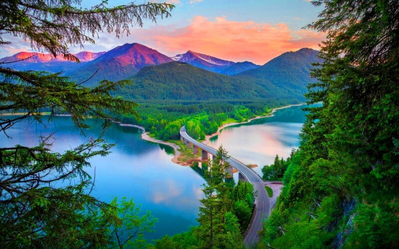 Curved Bridge over Lake — Blue