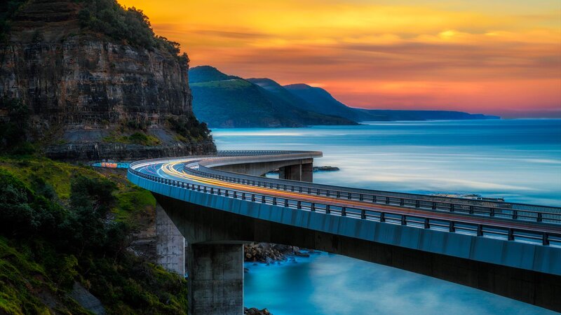 Curved Bridge over Ocean