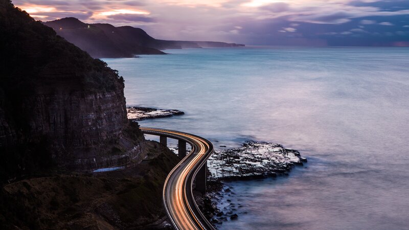 Curved Coastal Road — Blue, Serene
