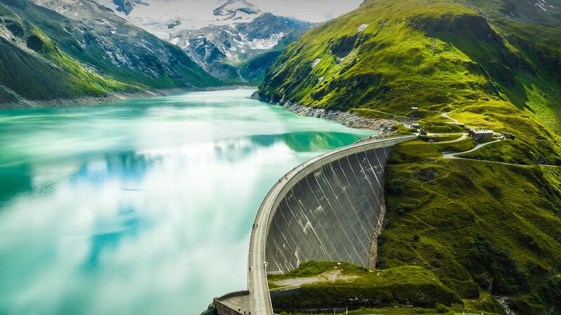 Curved Dam in Mountains
