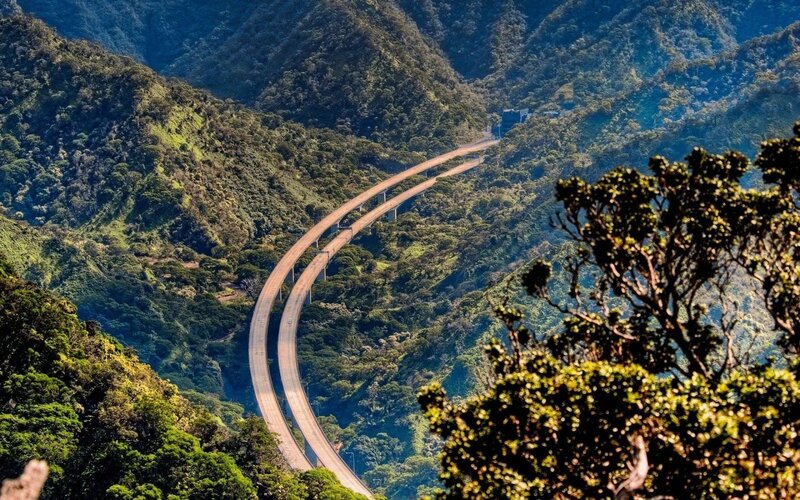 Curved Highway in Mountains — Green, Serene