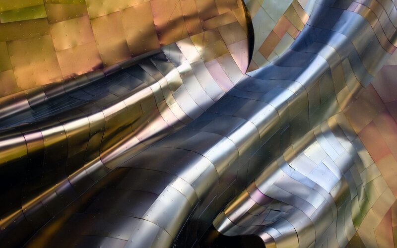 curved metallic architectural surface