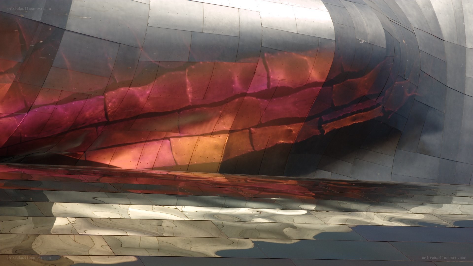 curved metallic structure with reflections