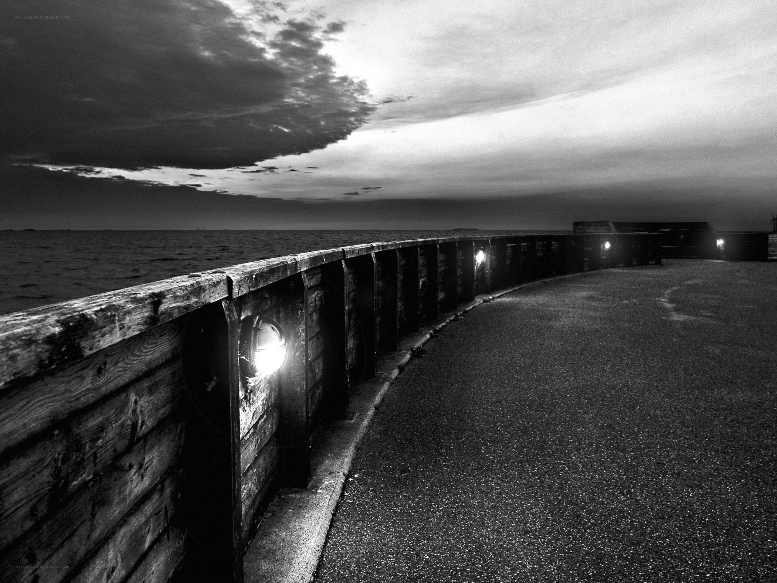 curved pier at dusk