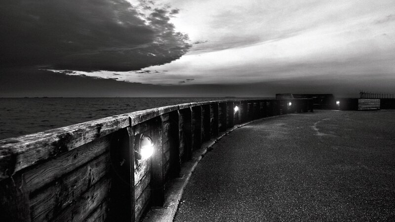 Curved Pier at Dusk — Black, Dramatic, Night