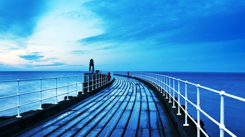 Curved Pier at Dusk — Blue