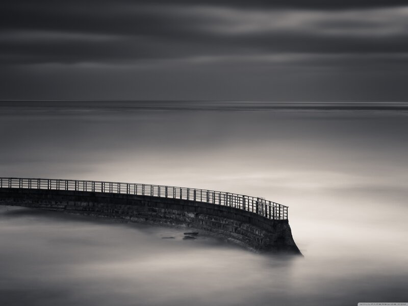 Curved Pier at Sea