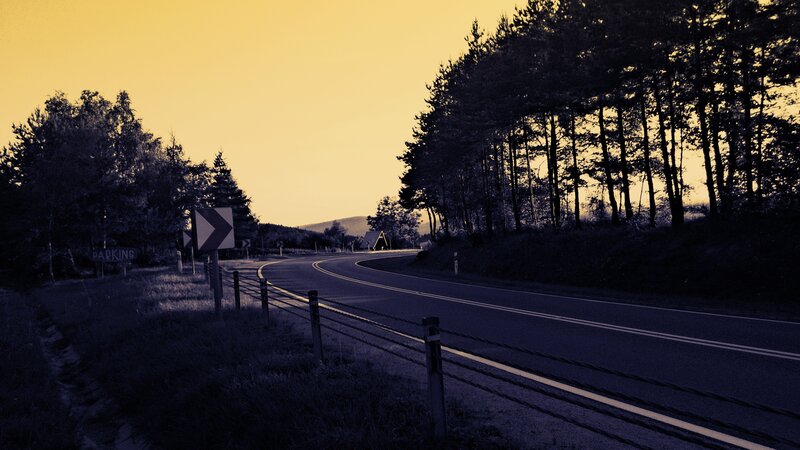 Curved Road at Dusk — Yellow