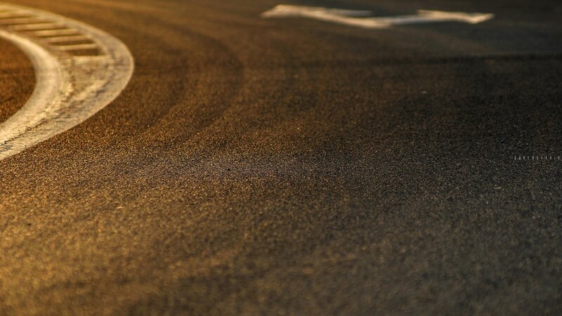 curved road at golden hour