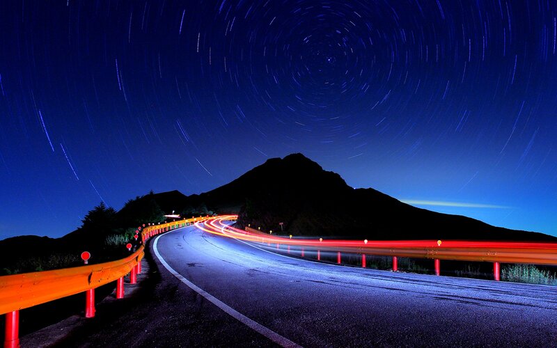 Curved Road at Night — Blue