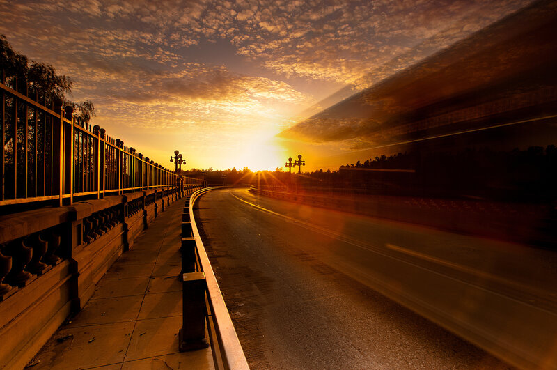 Curved Road at Sunset — Orange, Dramatic, Photograph