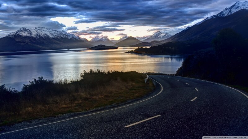 Curved Road by Lake — Blue