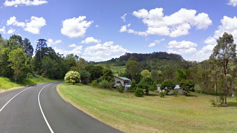 Curved Road in Countryside — Blue, Serene