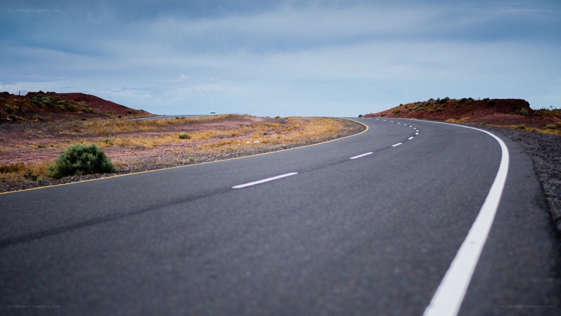 curved road in desert landscape