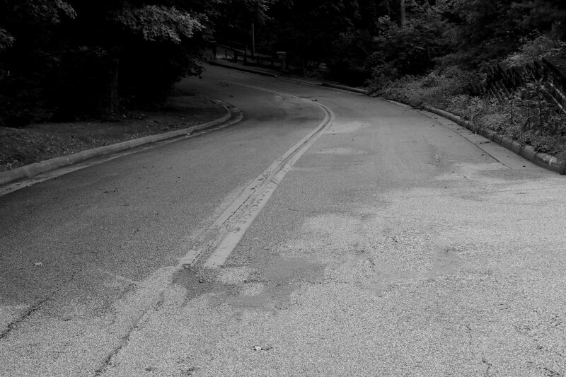 Curved Road in Forest — Black